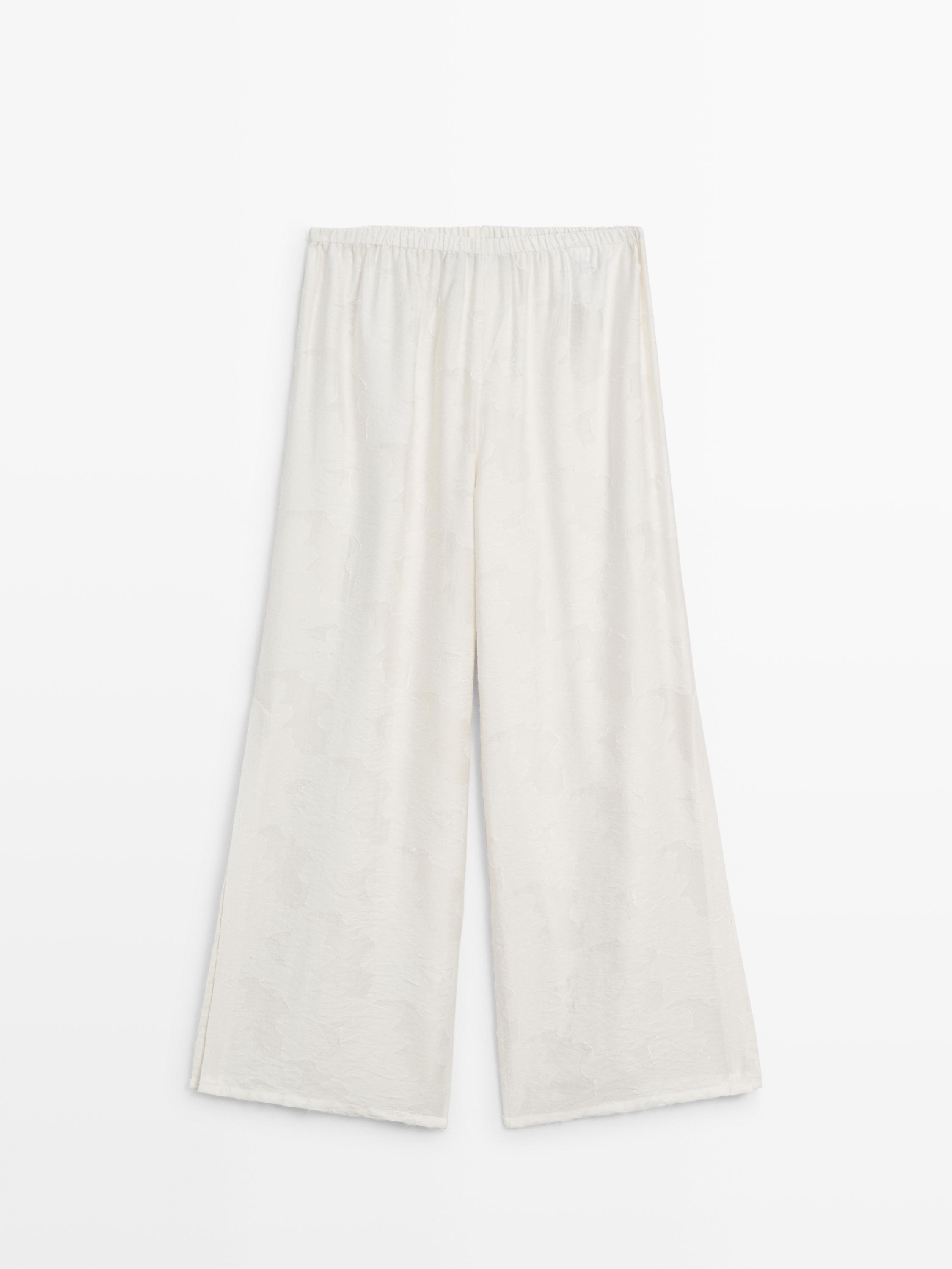 Flowing stretch trousers with fabric detail — White