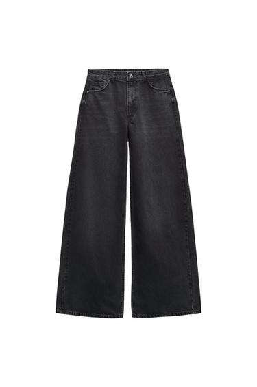 Black wide-leg denim jeans with front pockets and button fastening, on a white background.