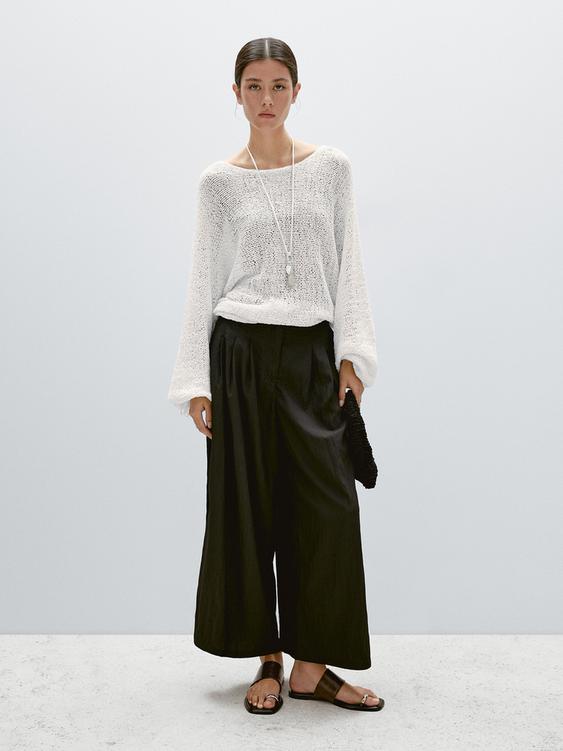 Flowing palazzo trousers with darts