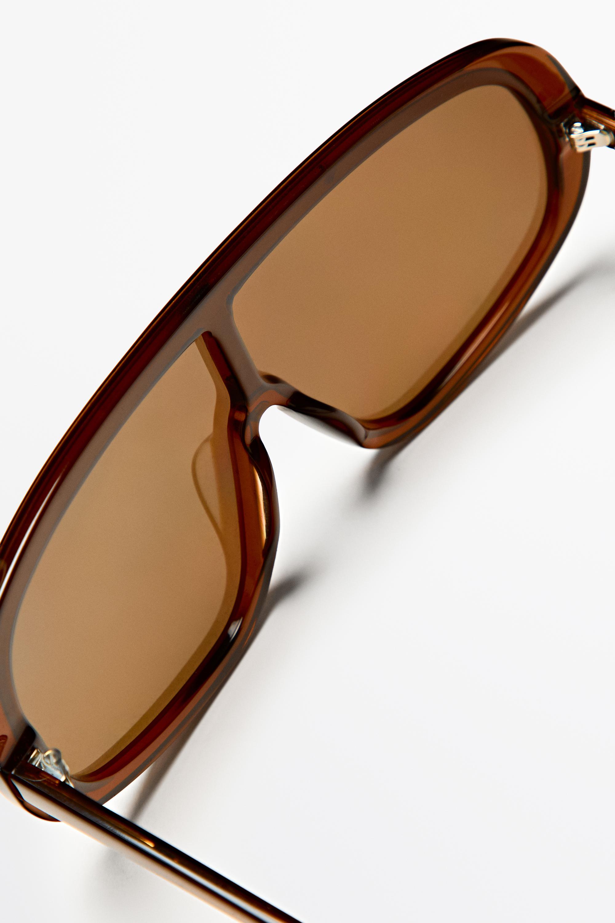 Lunettes de soleil enveloppantes oversize