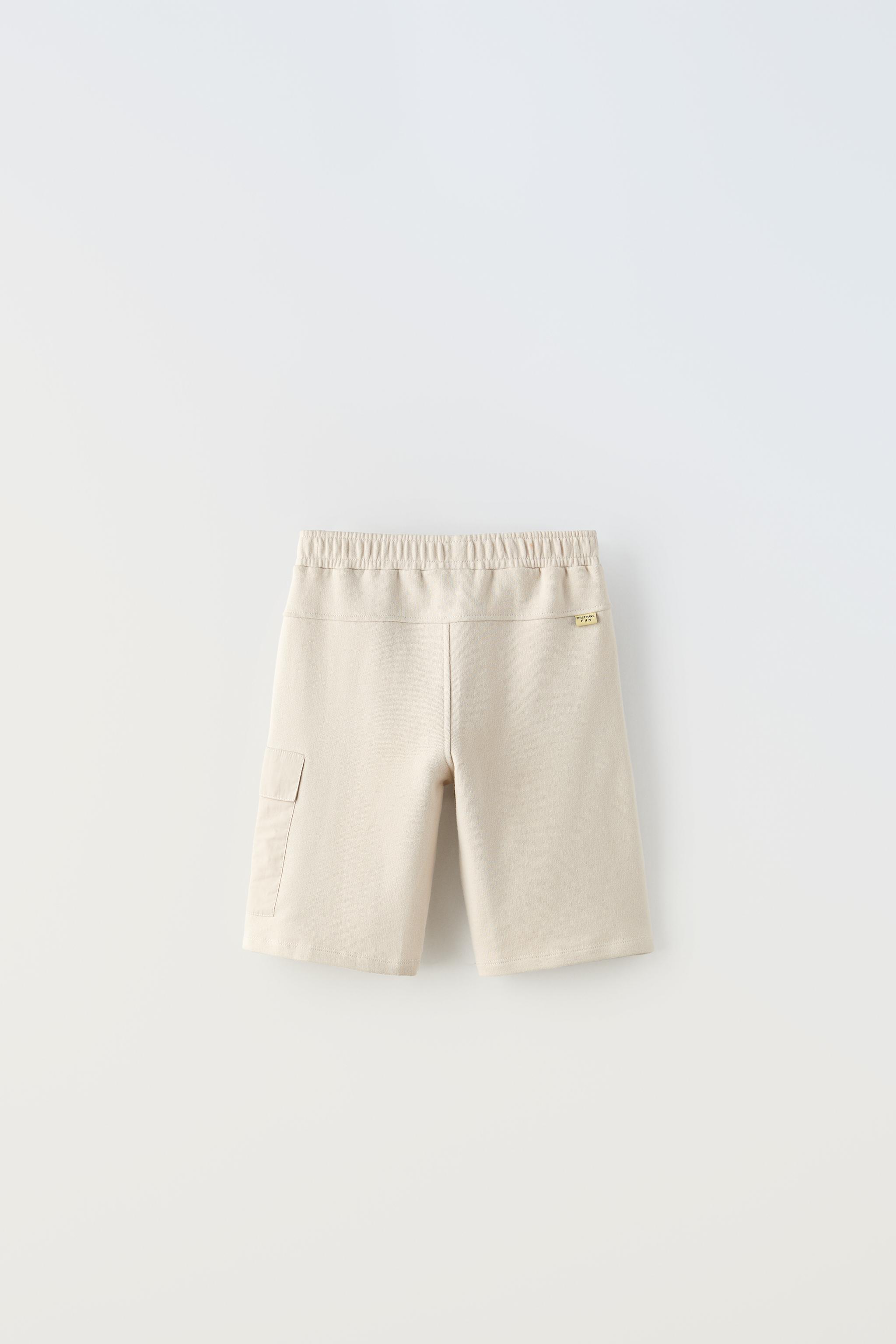 COMBINATION BUCKLED PLUSH SHORTS