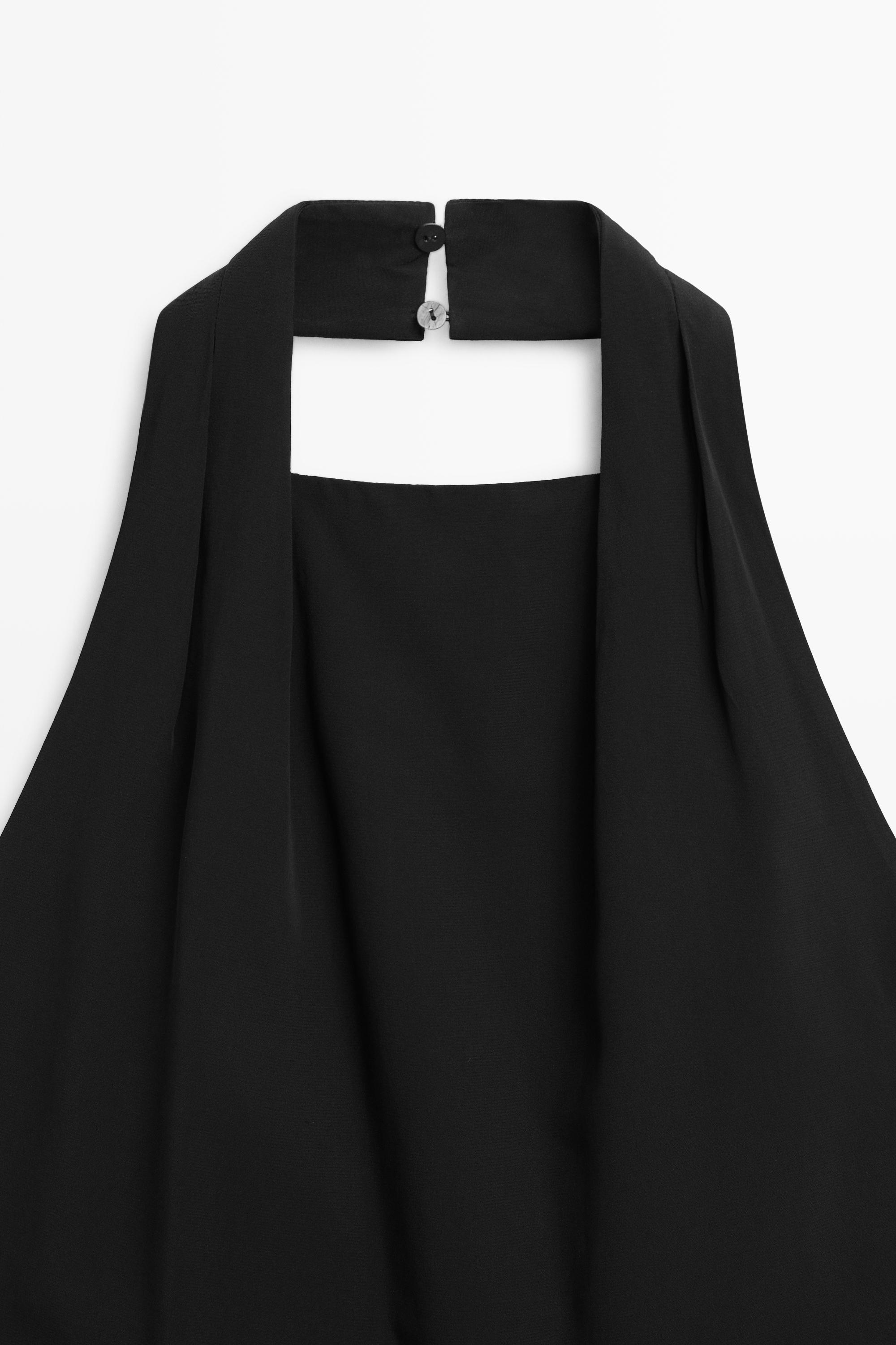 Flowing open-back top