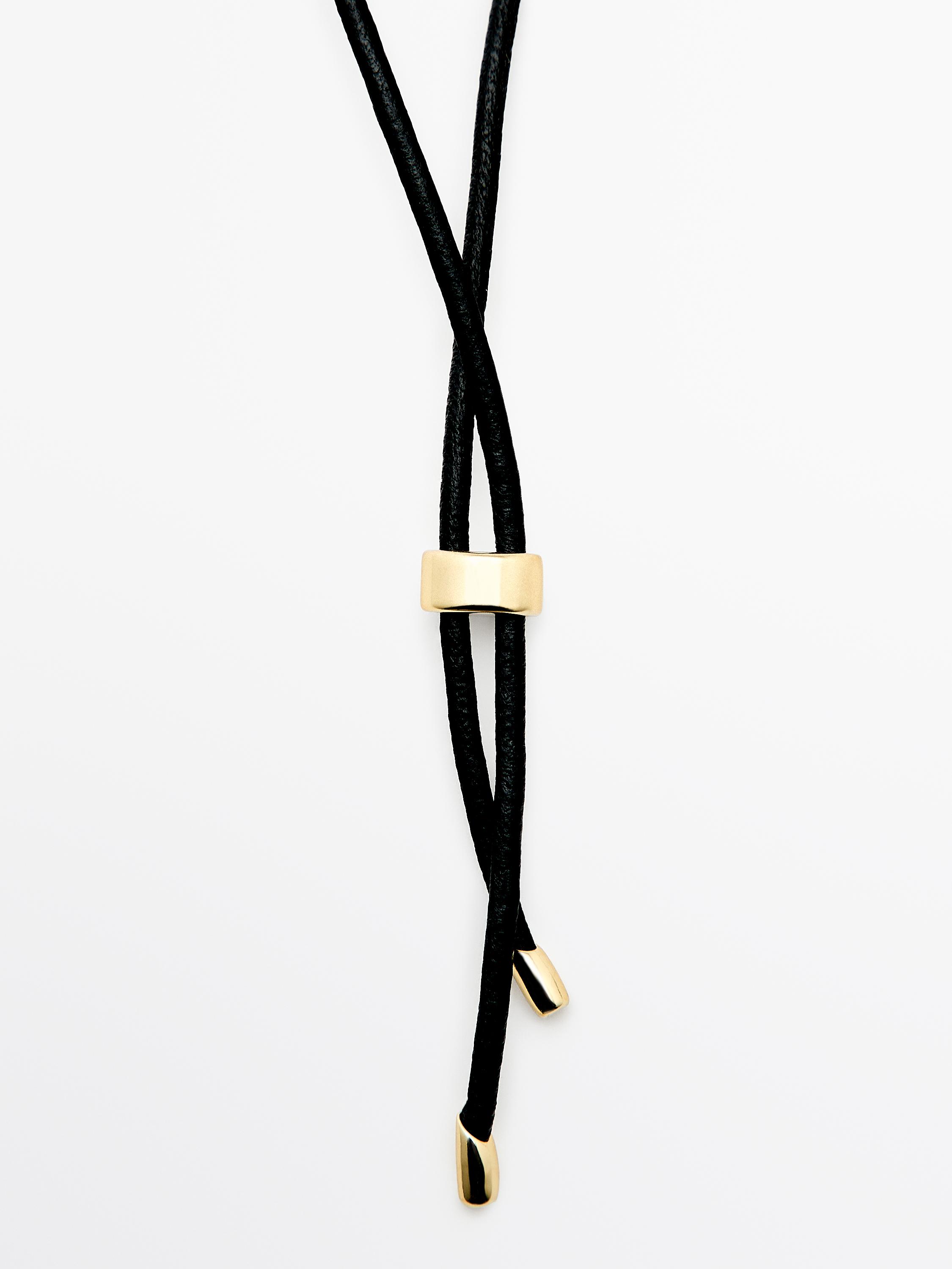 Leather cord necklace with fossil pendant