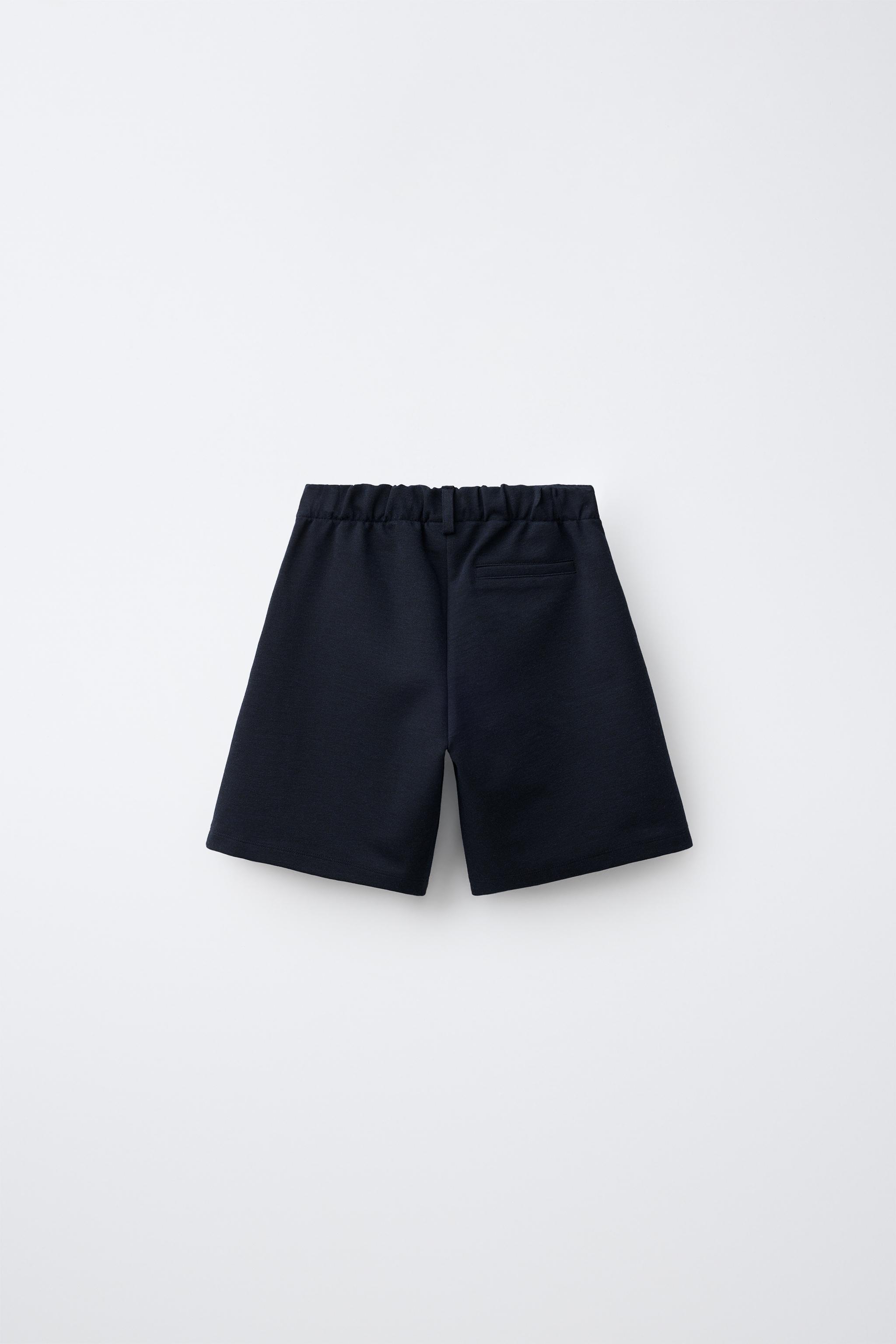 LONG PLEATED SHORTS — Navy blue