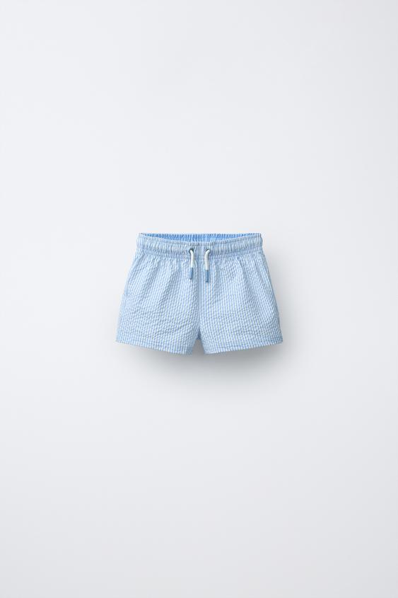 1-6 AÑOS/ BERMUDA BAÑO SEERSUCKER RAYAS - Azul claro de Zara - Imagen 0
