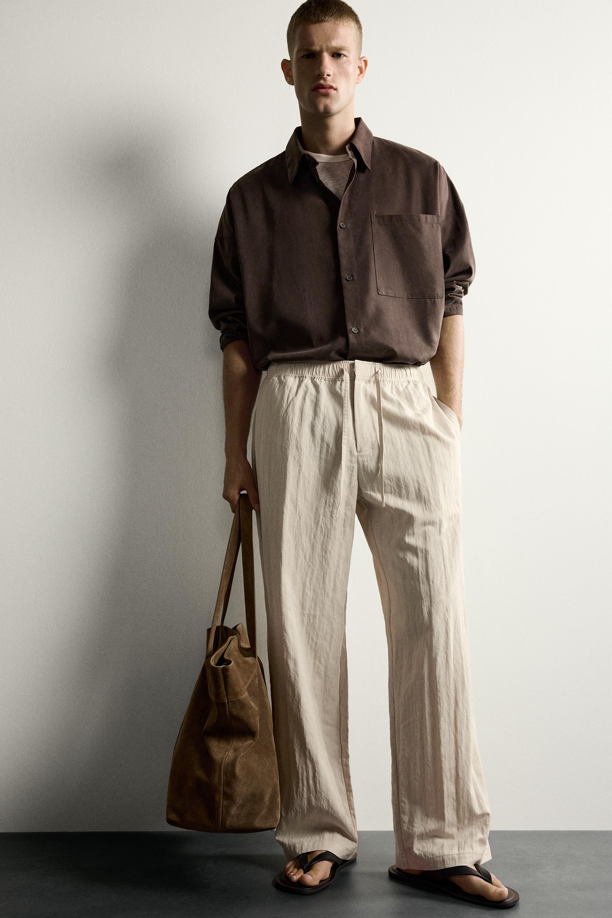CRINKLED EFFECT TECHNICAL RELAXED FIT PANTS