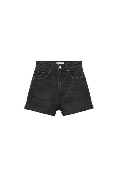 Black denim shorts with rolled hem, five pockets, and button closure. Visible label on the back of the waistband.