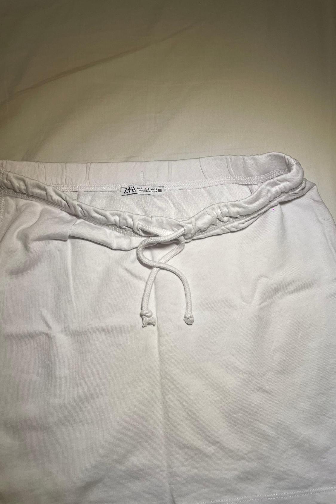 MINI SKIRT WITH CORDS - Image 3