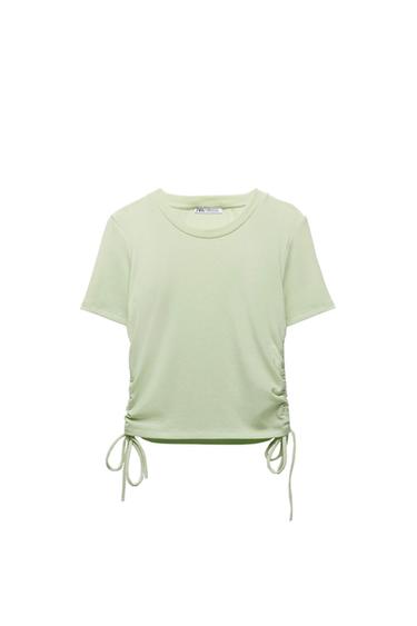 Light green short-sleeved, round-neck T-shirt. Featuring gathered detail with drawstrings at the side hems. Visible ZARA label.