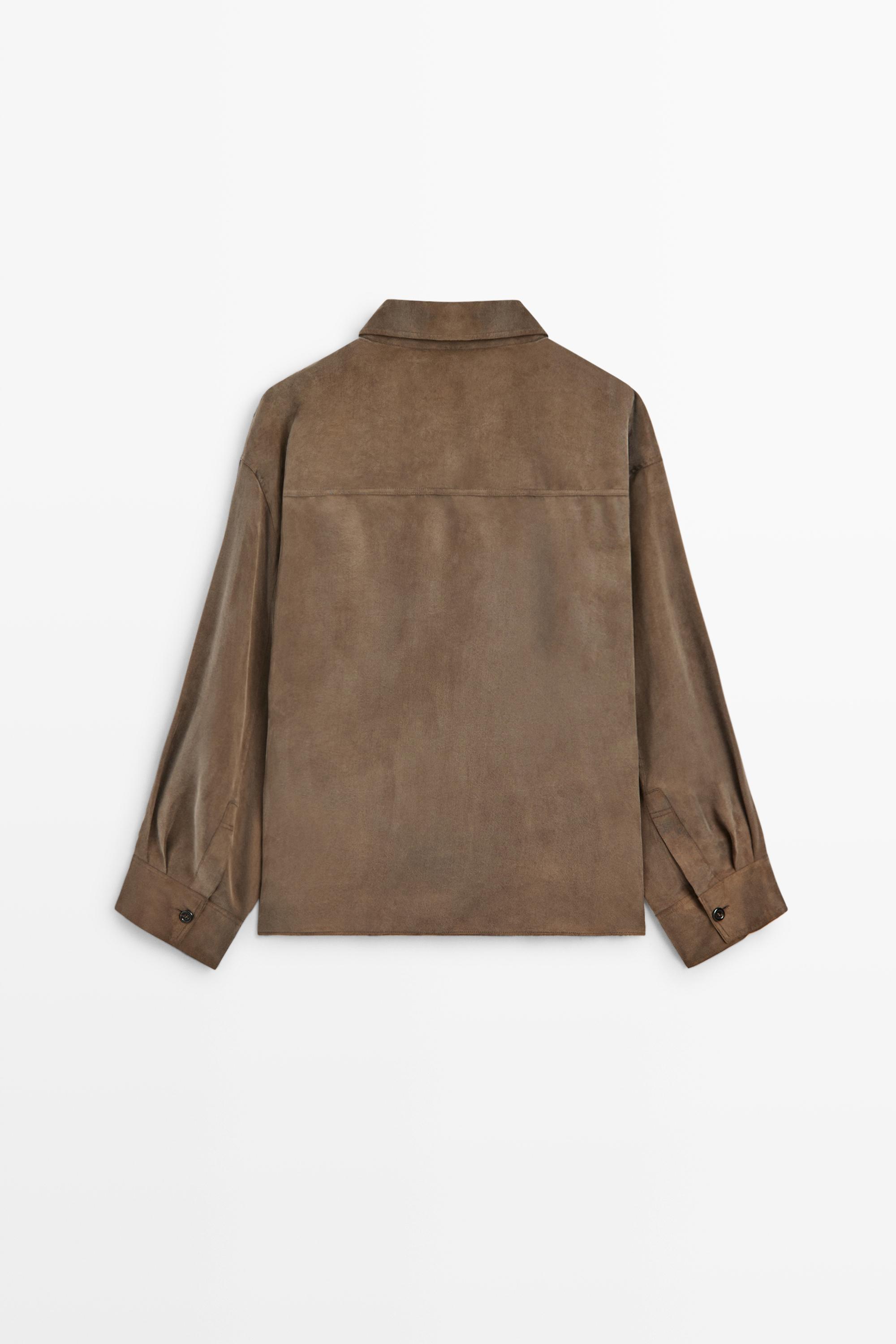 Flowing shirt with stand collar and bib detail