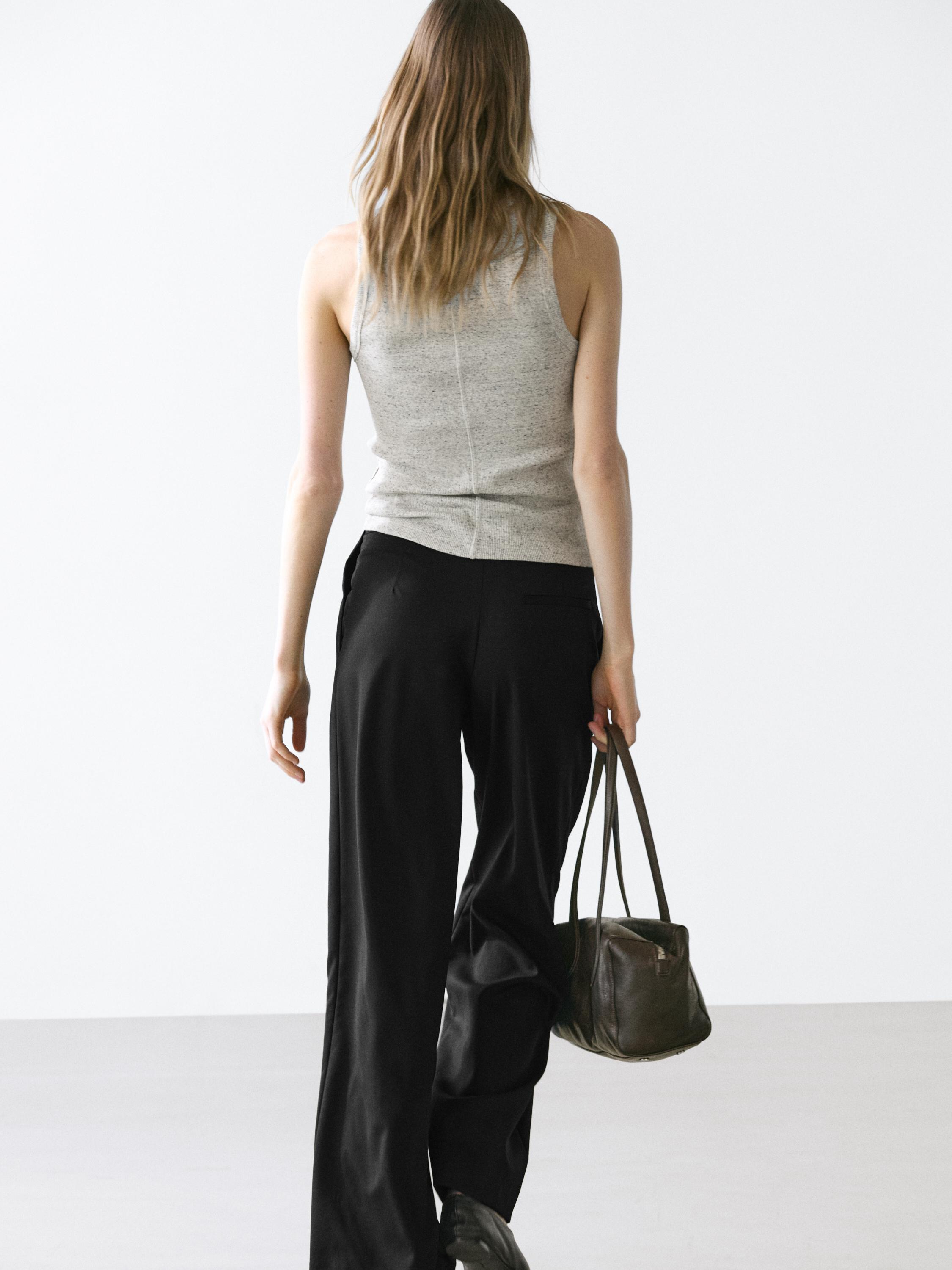 Pleated extra fine wool trousers