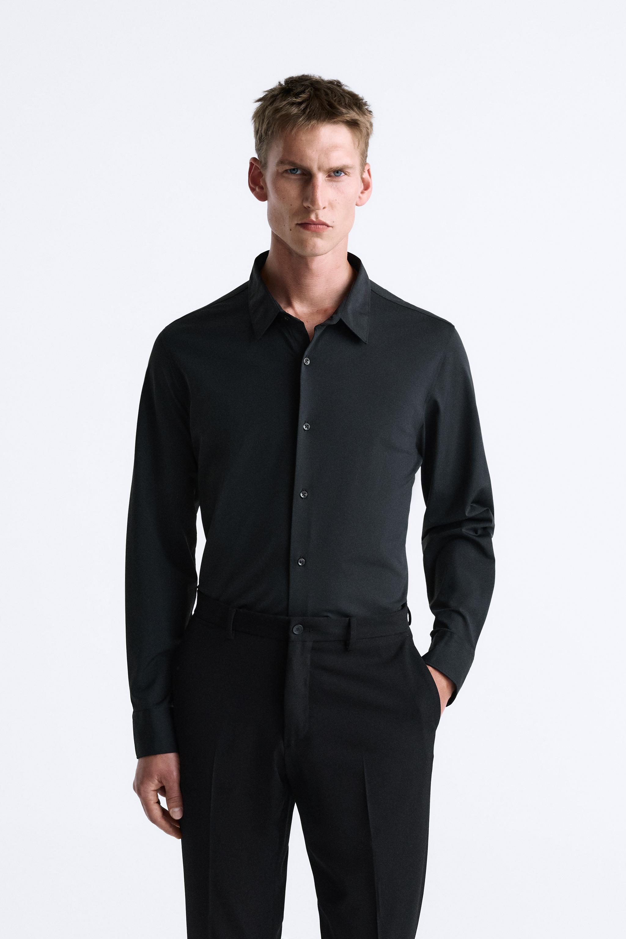 Camiseta negra store hombre zara