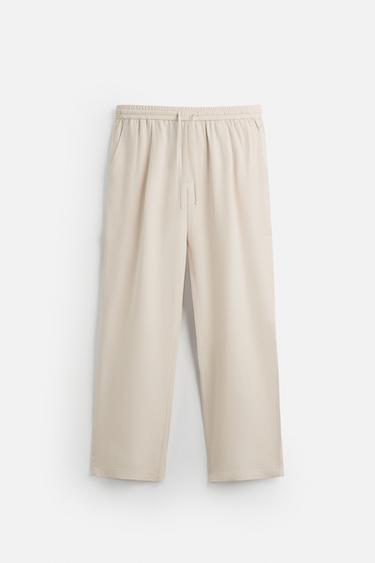 RELAXED FIT LYOCELL TROUSERS - Beige by Zara