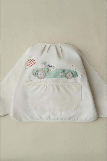 CHILDREN'S BIB WITH RACER DOG SLEEVES - Light beige by Zara