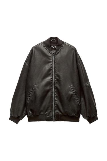 Front view of a black jacket with a zipper and side pockets.