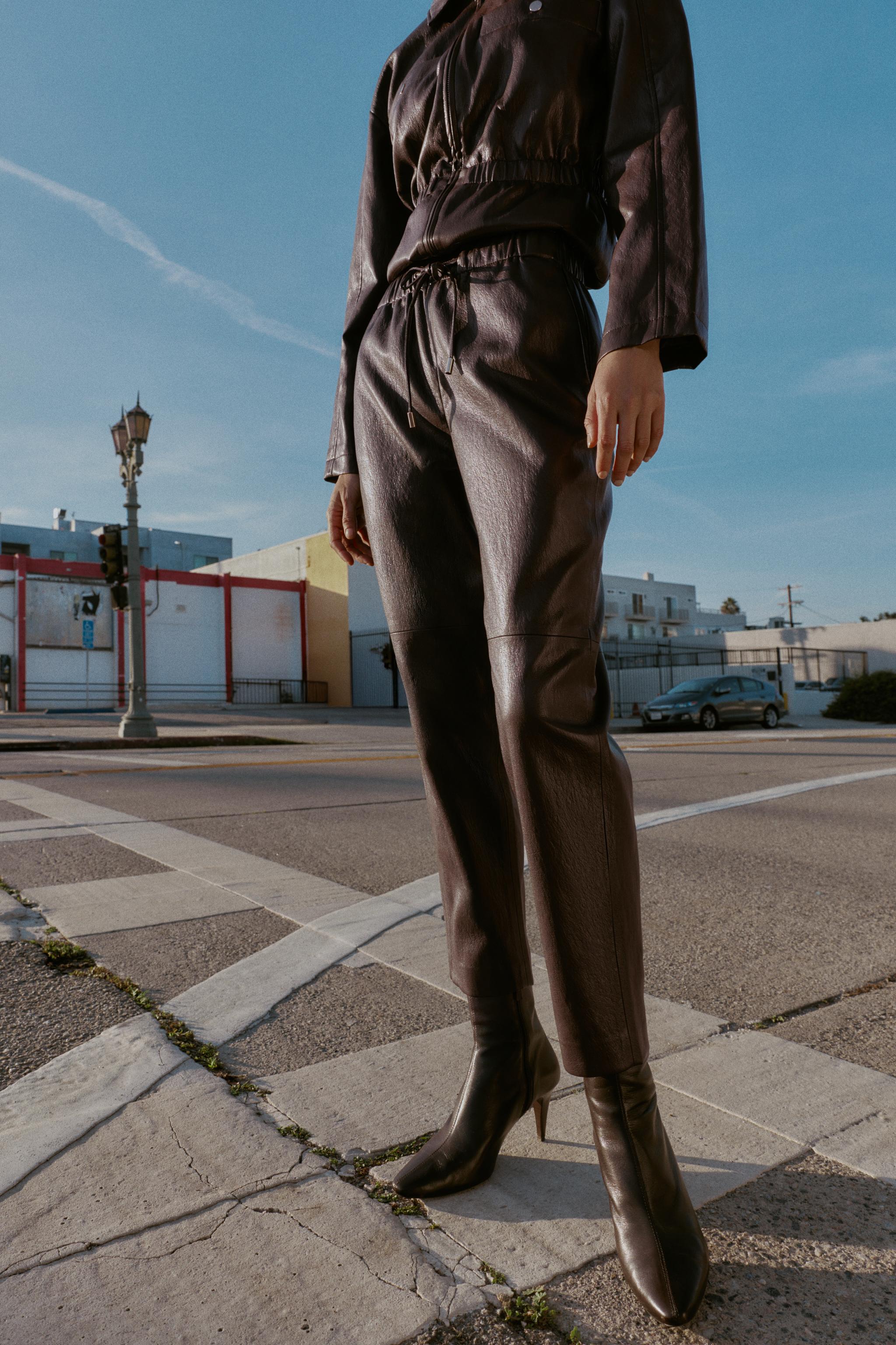 FAUX LEATHER ELASTIC WAIST PANTS