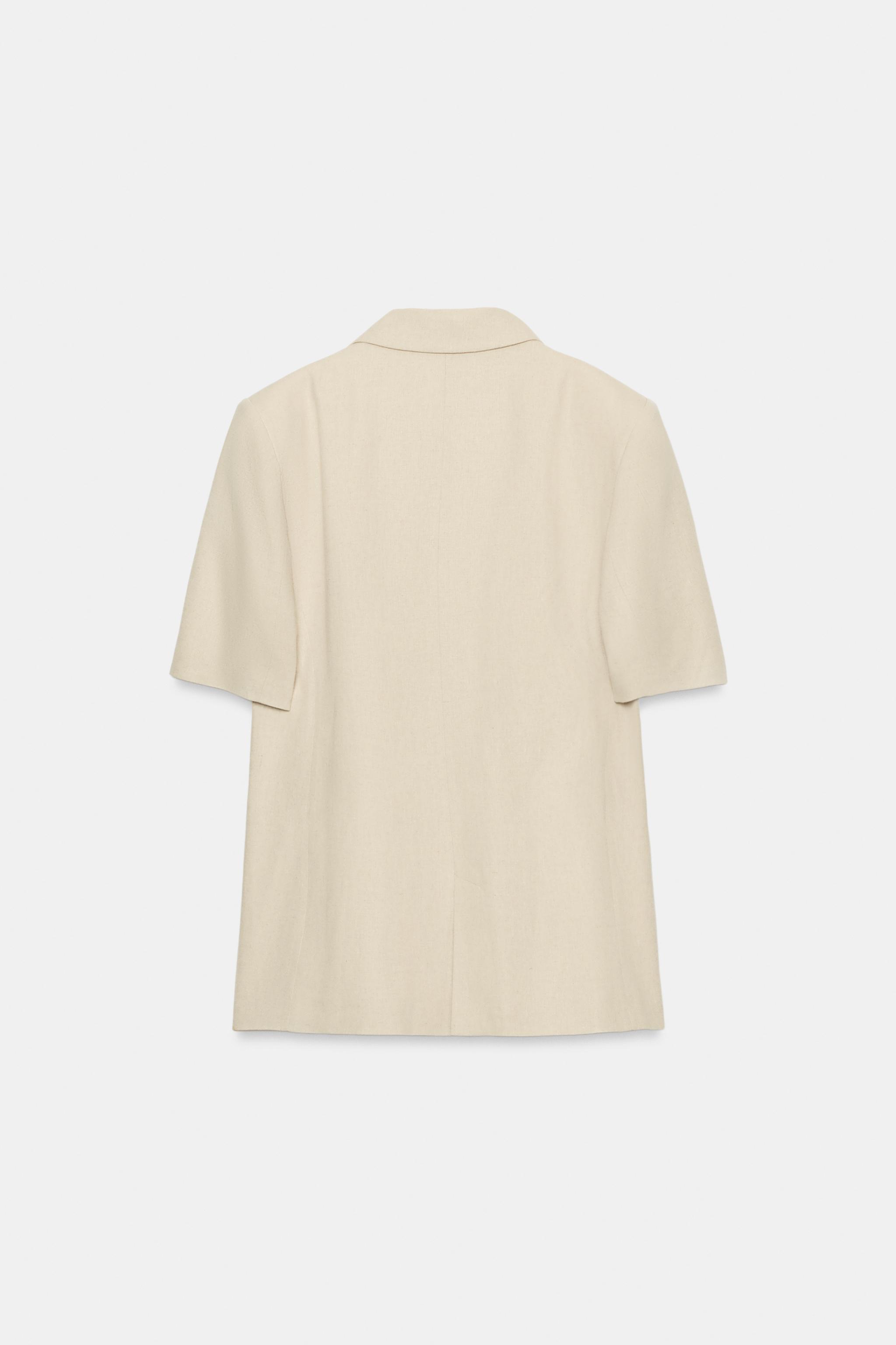 VESTE À BOUTONNAGE CROISÉ EN LIN ET MANCHES COURTES