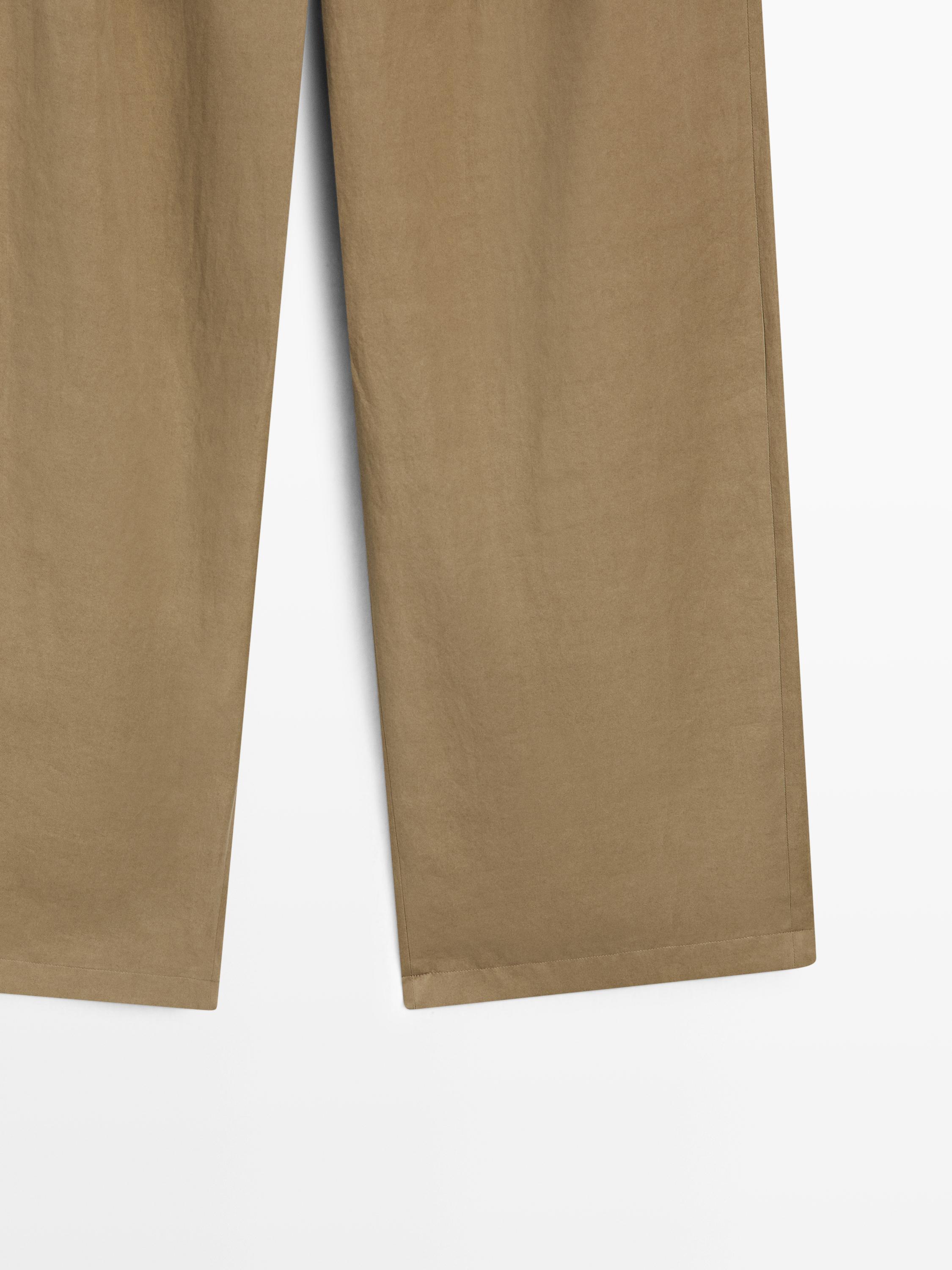 Pantalon à plis avec fermeture croisée - STUDIO