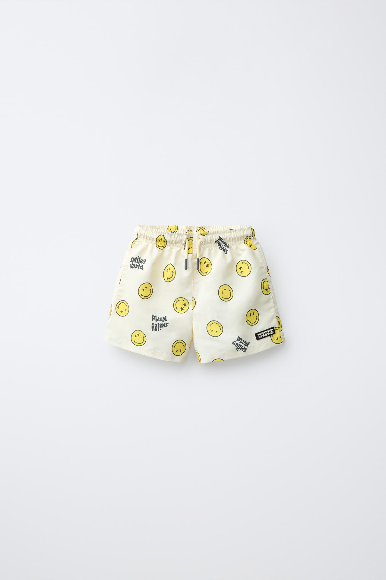 2-6 YEARS/ SMILEYWORLD ® SWIM SHORTS — Light yellow