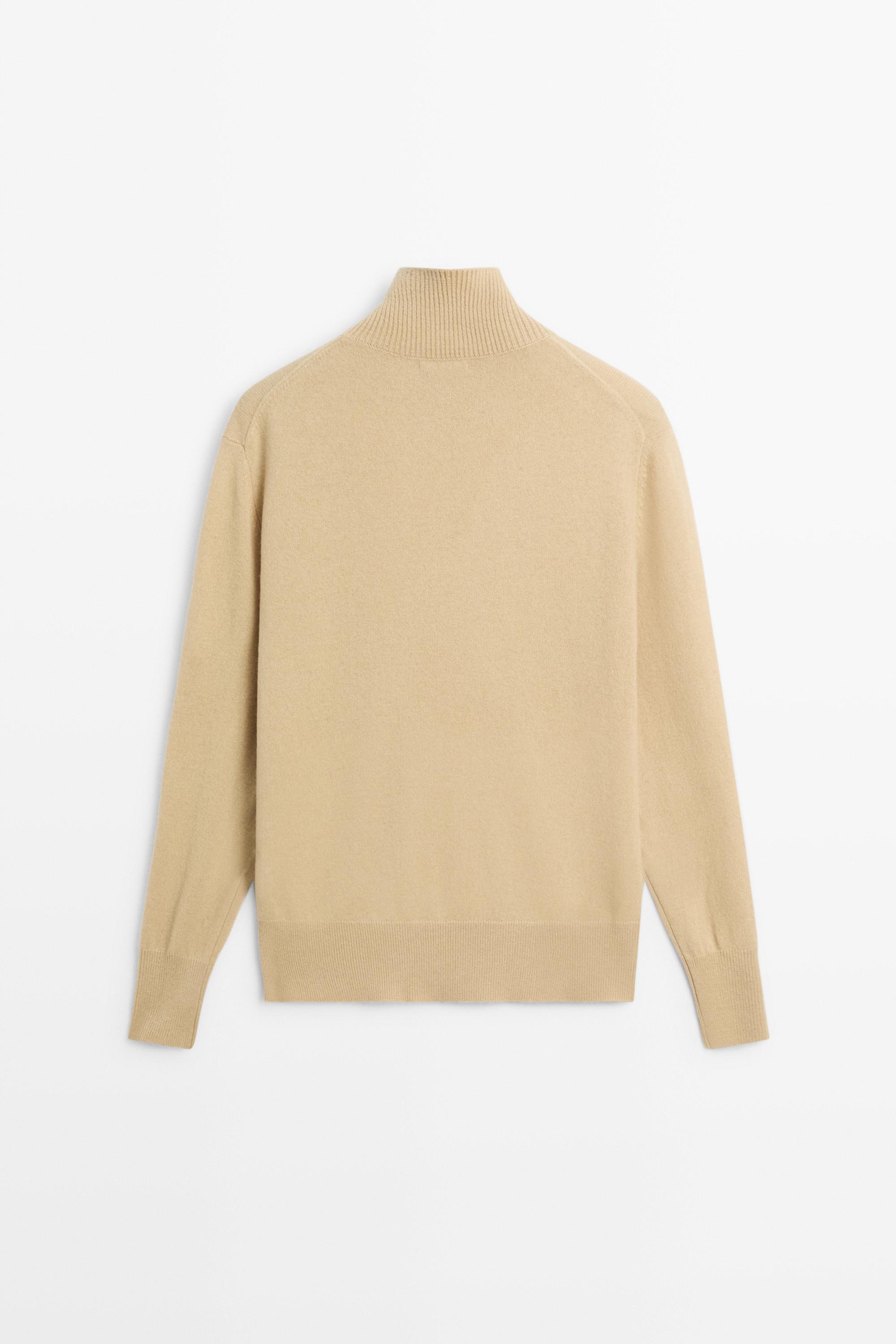 High neck knit sweater with button detail