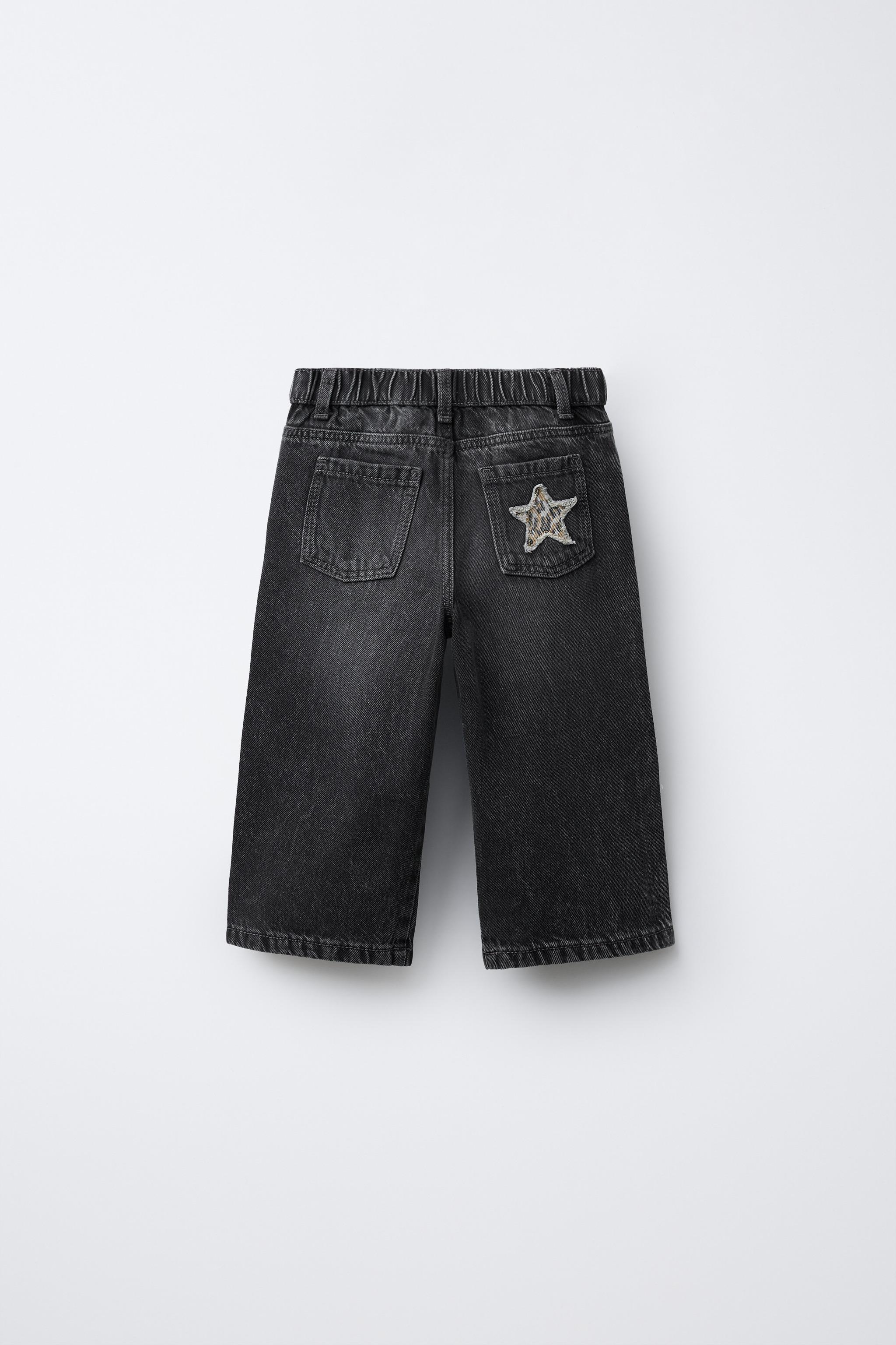 JEAN LARGE AVEC PIÈCES ÉTOILES ANIMAL PRINT