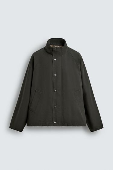 جاكيت تقني بمزيج من القطن - كاكي داكن by Zara