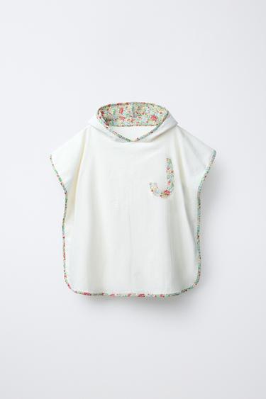 PONCHO TOALLA TEXTURA INICIAL VIVOS FLORES - de Zara