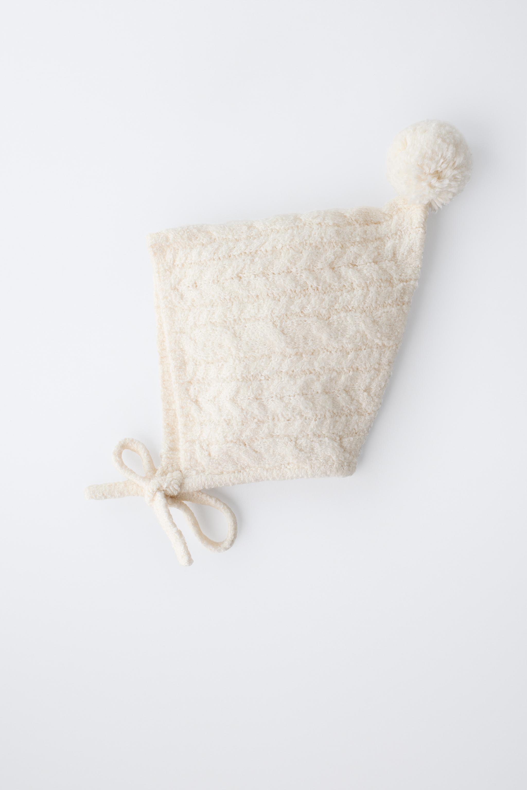 CABLE KNIT BONNET WITH POMPOM - Ecru | ZARA United Kingdom
