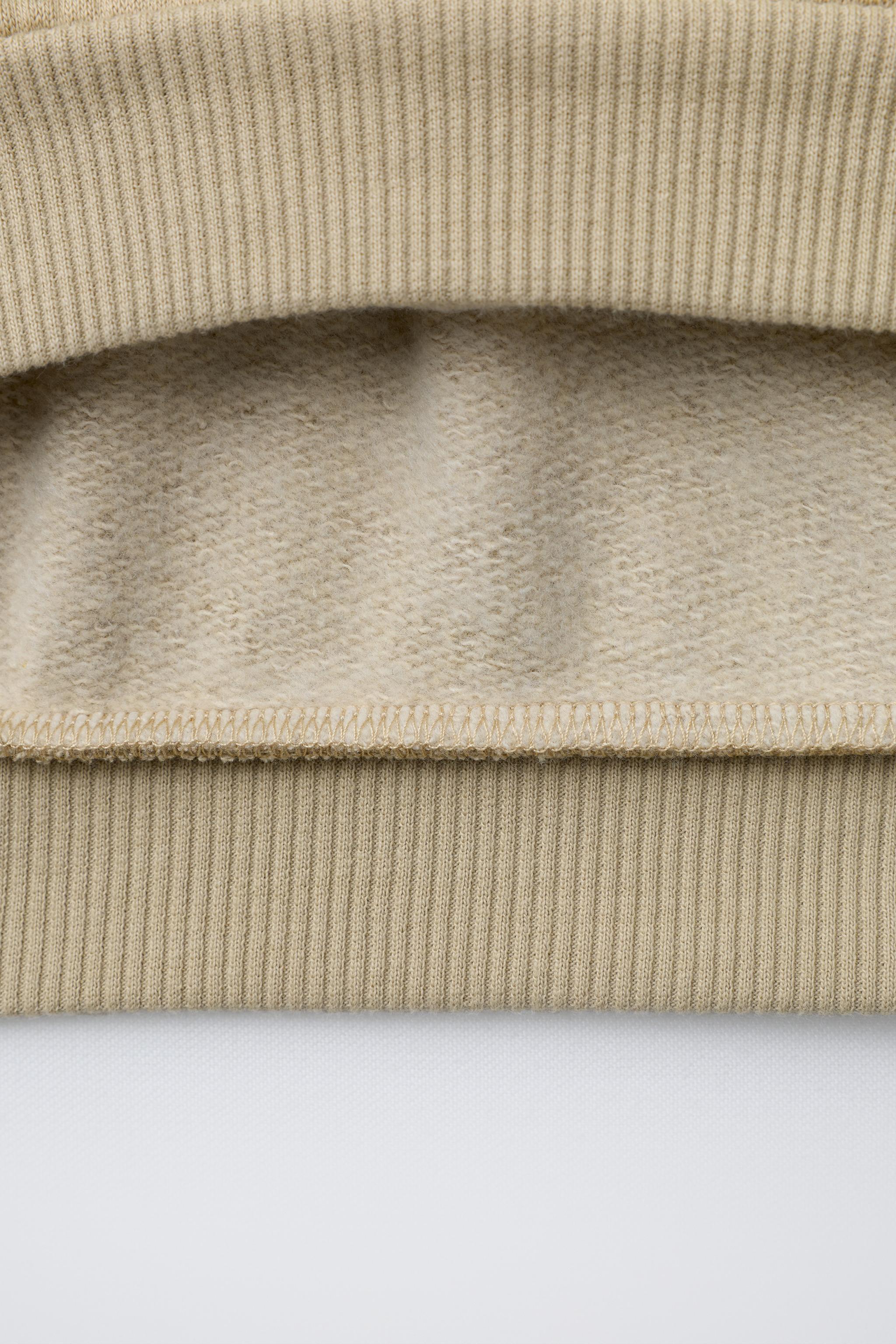 TAXI PRINT SWEATSHIRT