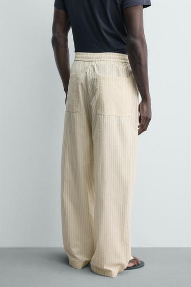 PANTALON COUPE DÉCONTRACTÉE À RAYURES CONTRASTANTES - Rayures de Zara - Image 2