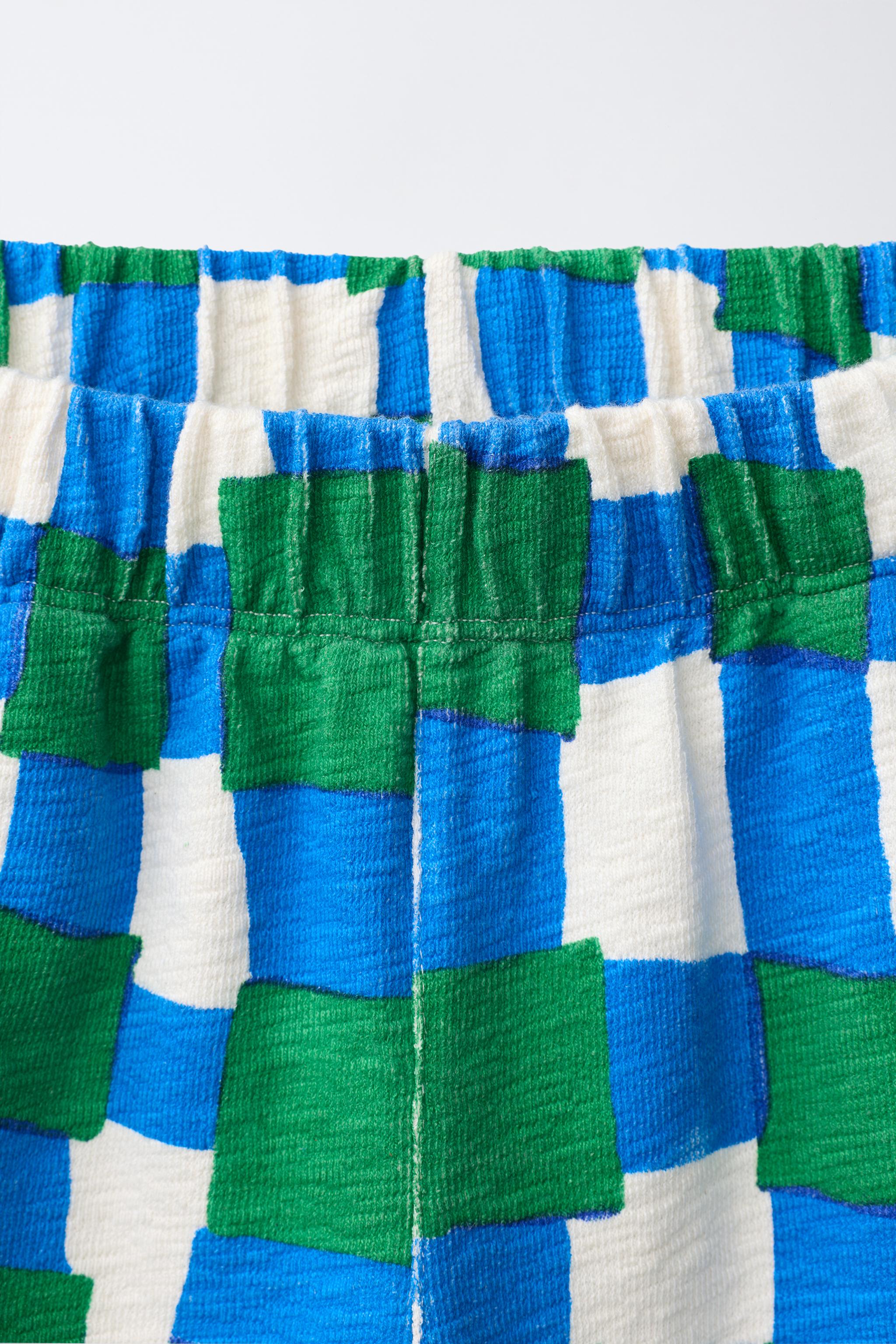 CLARA CEBRIAN © PLAID SHORTS