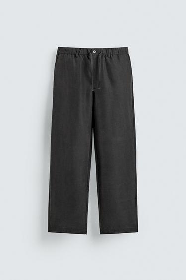 FLUID RELAXED FIT TROUSERS - Black by Zara