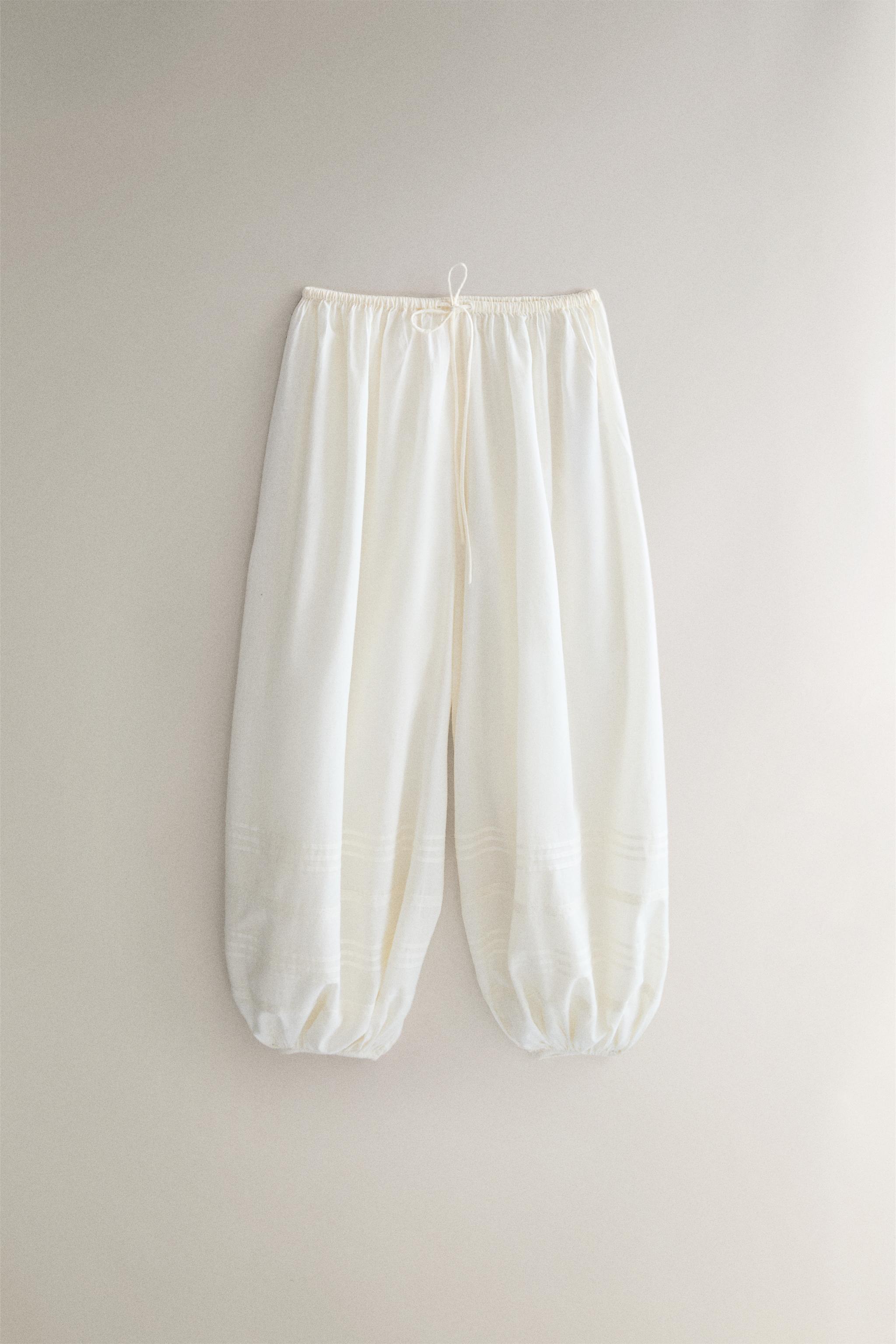 SMOCKED TROUSERS WITH LACE AND DRAWSTRINGS — Ivory
