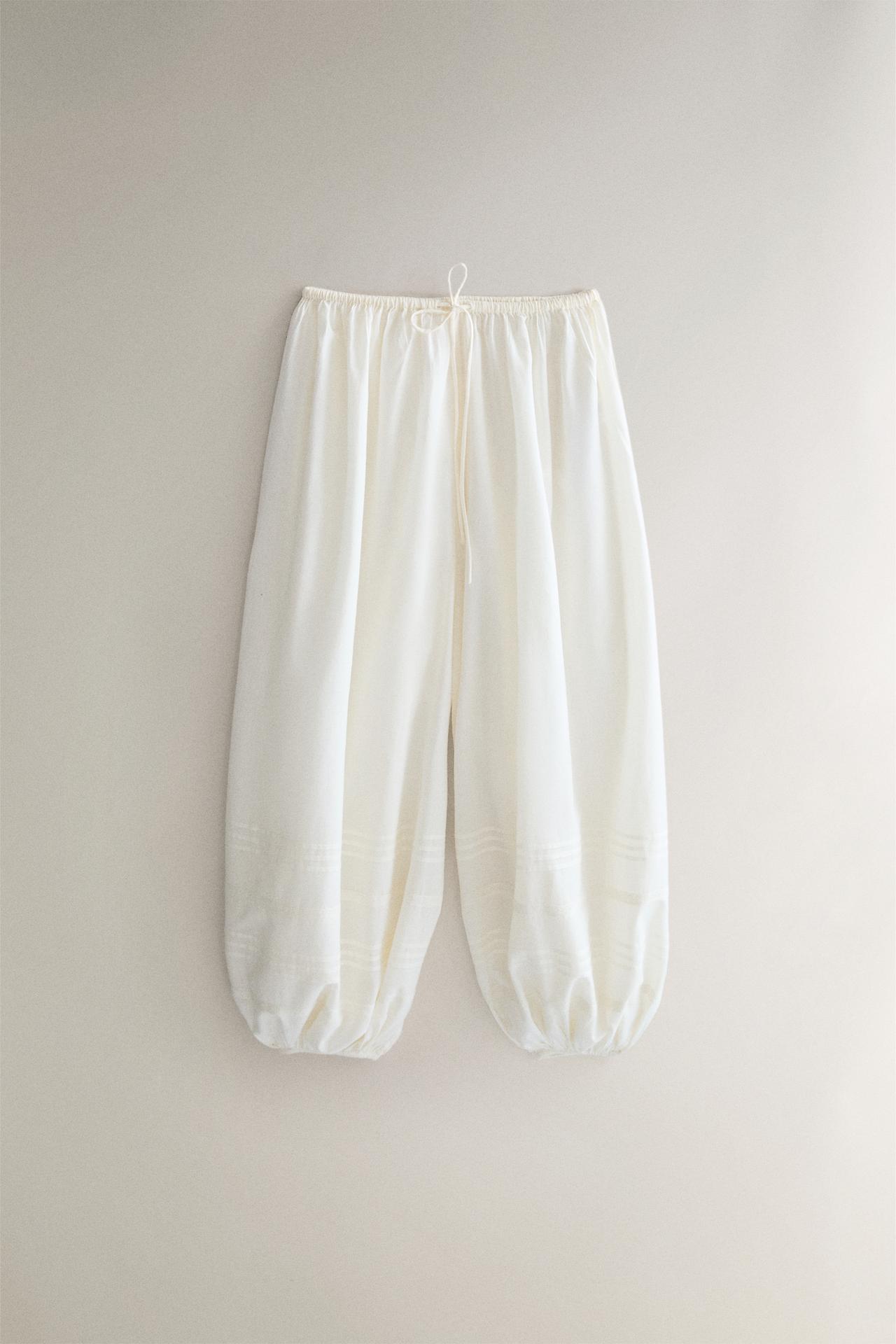 SMOCKED TROUSERS WITH LACE AND DRAWSTRINGS — Ivory