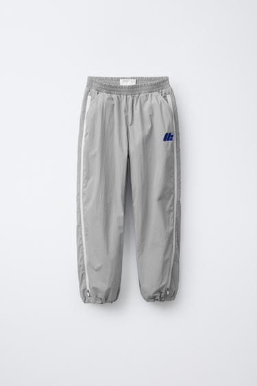 NYLON JOGGERS WITH ZIPS - Stone by Zara - Image 0