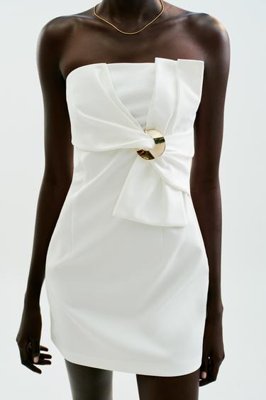 MINIKLEID MIT SCHLEIFE UND GOLDFARBENER APPLIKATION - Cremefarben von Zara