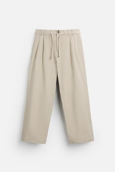 PANTALÓN RELAXED FIT PLIEGUES - Arena de Zara