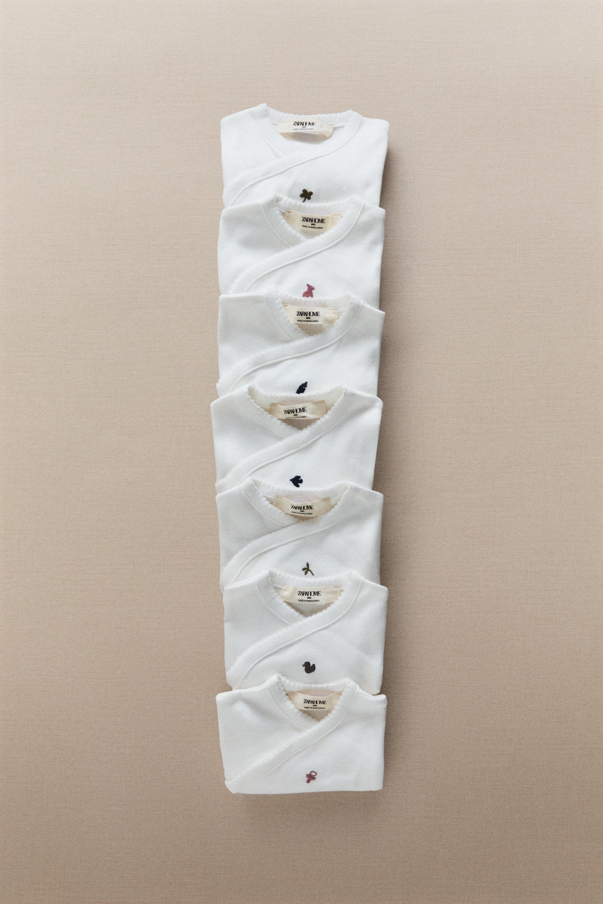 EMBROIDERED COTTON BODYSUIT SET (PACK OF 7)