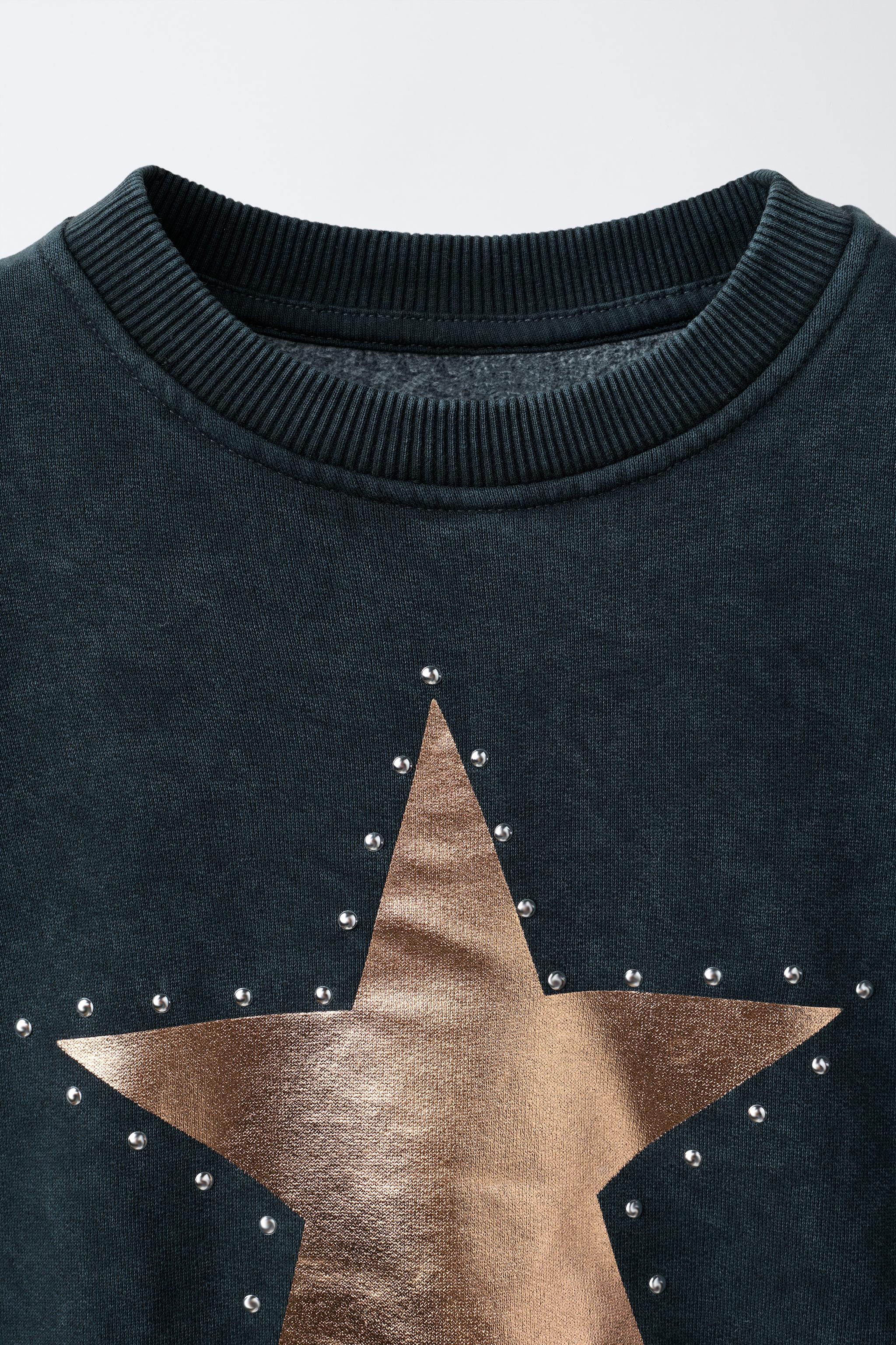 STUDDED STAR PRINT SWEATSHIRT