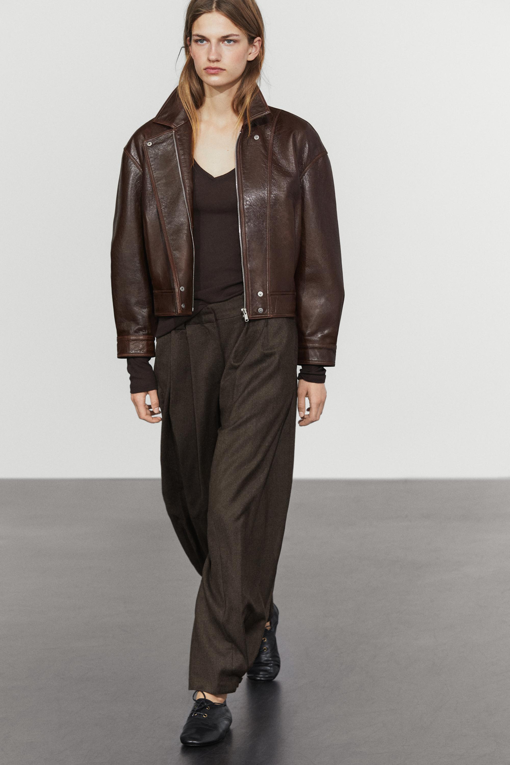 Pleated flannel trousers with hem detail