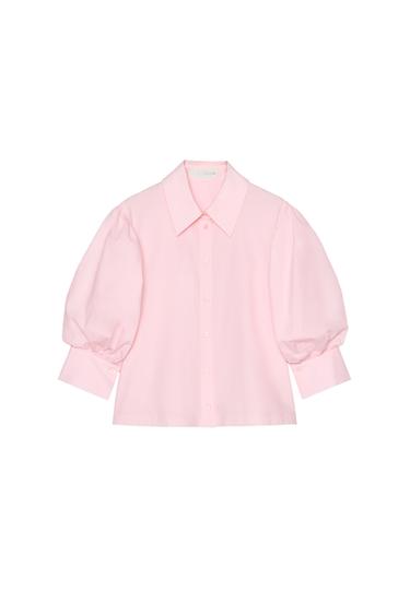 Front view of a pink blouse with puff sleeves and buttons.