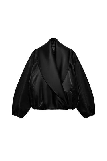 Front view of a black bomber jacket with a lapel collar, ruched long sleeves, and side pockets.