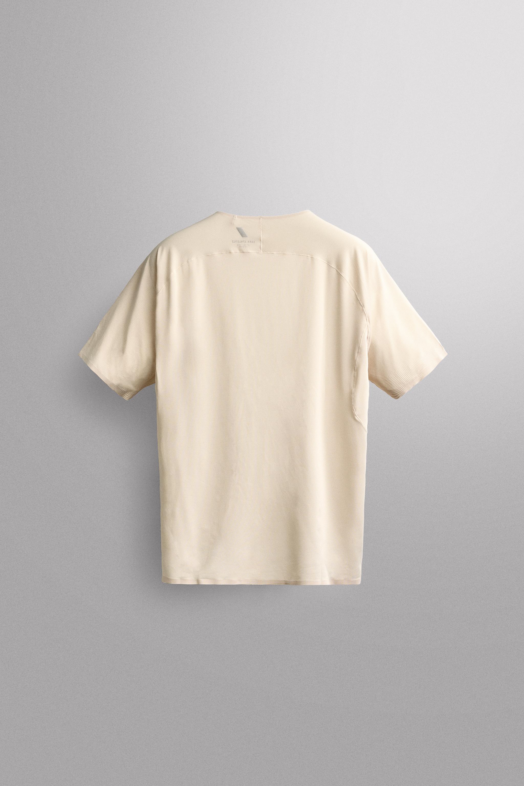 TEXTURED TECHNICAL T-SHIRT — Ecru