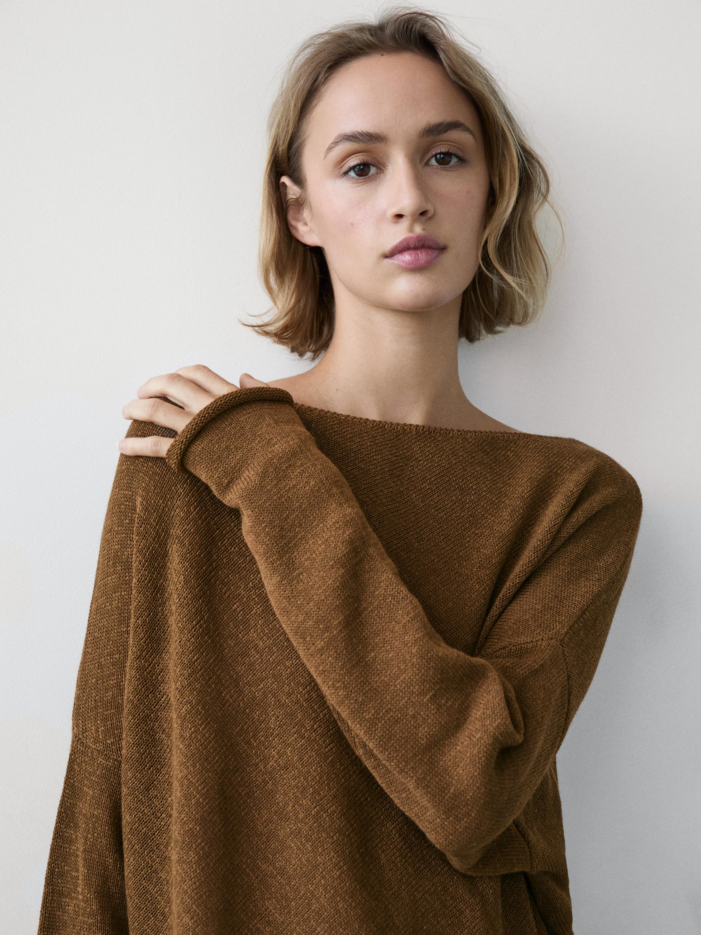 Asymmetric knit cape sweater