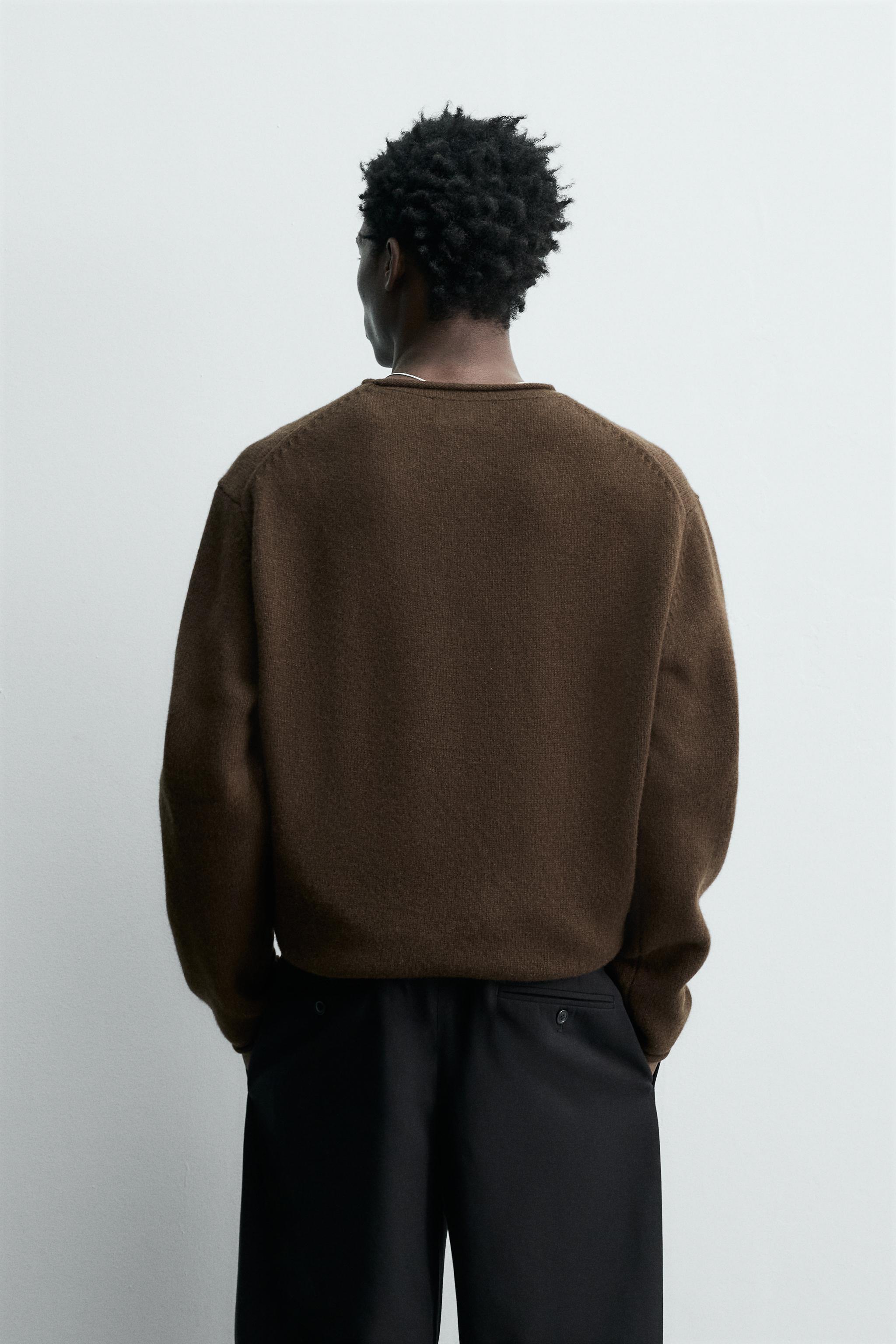 100% WOOL ROLLED-EDGE SWEATER