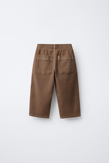 TOPSTITCHED ELASTICATED BAGGY TROUSERS - Dark tan by Zara - Image 1