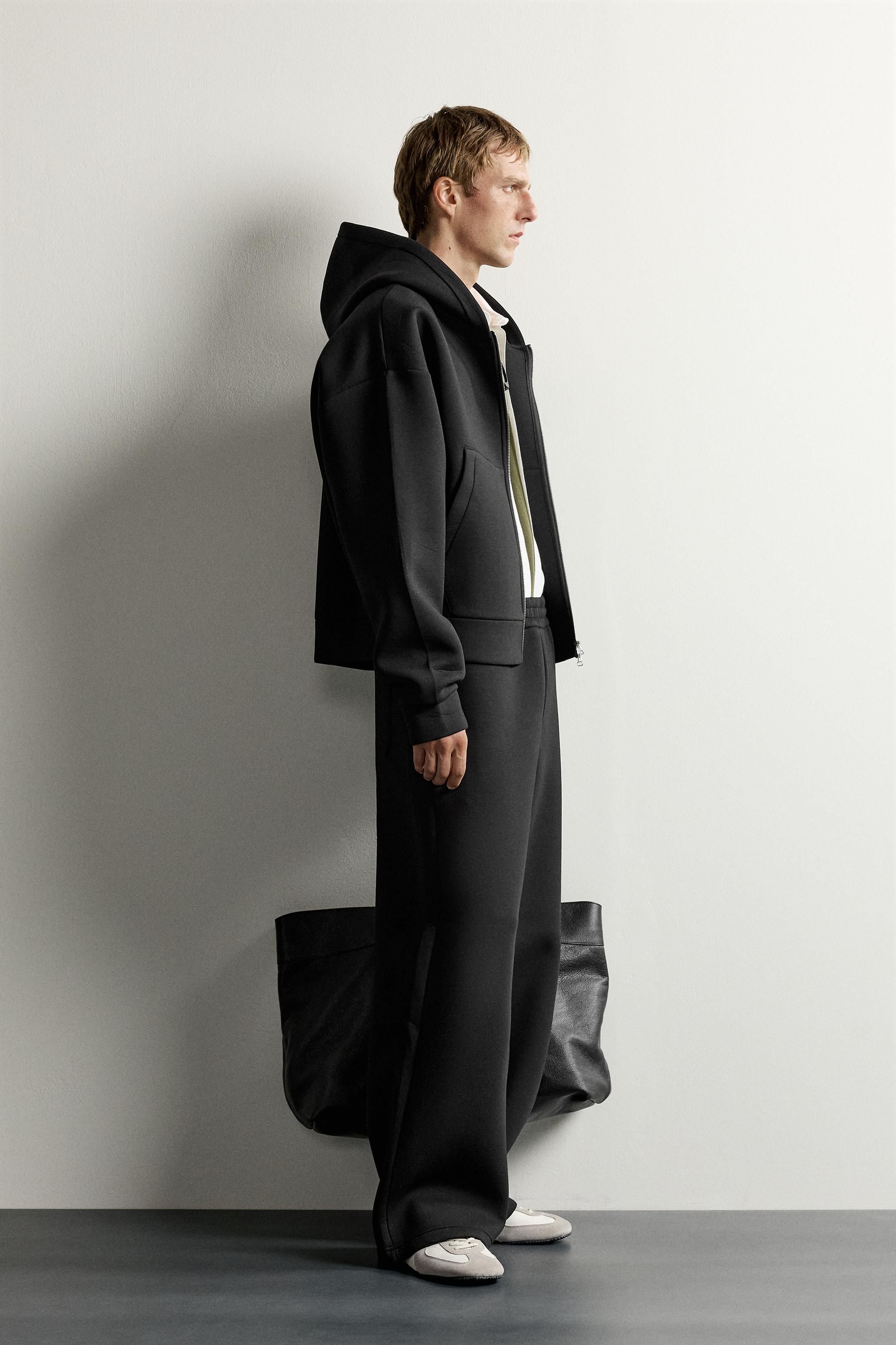 TECHNICAL ZIP-UP HOODIE