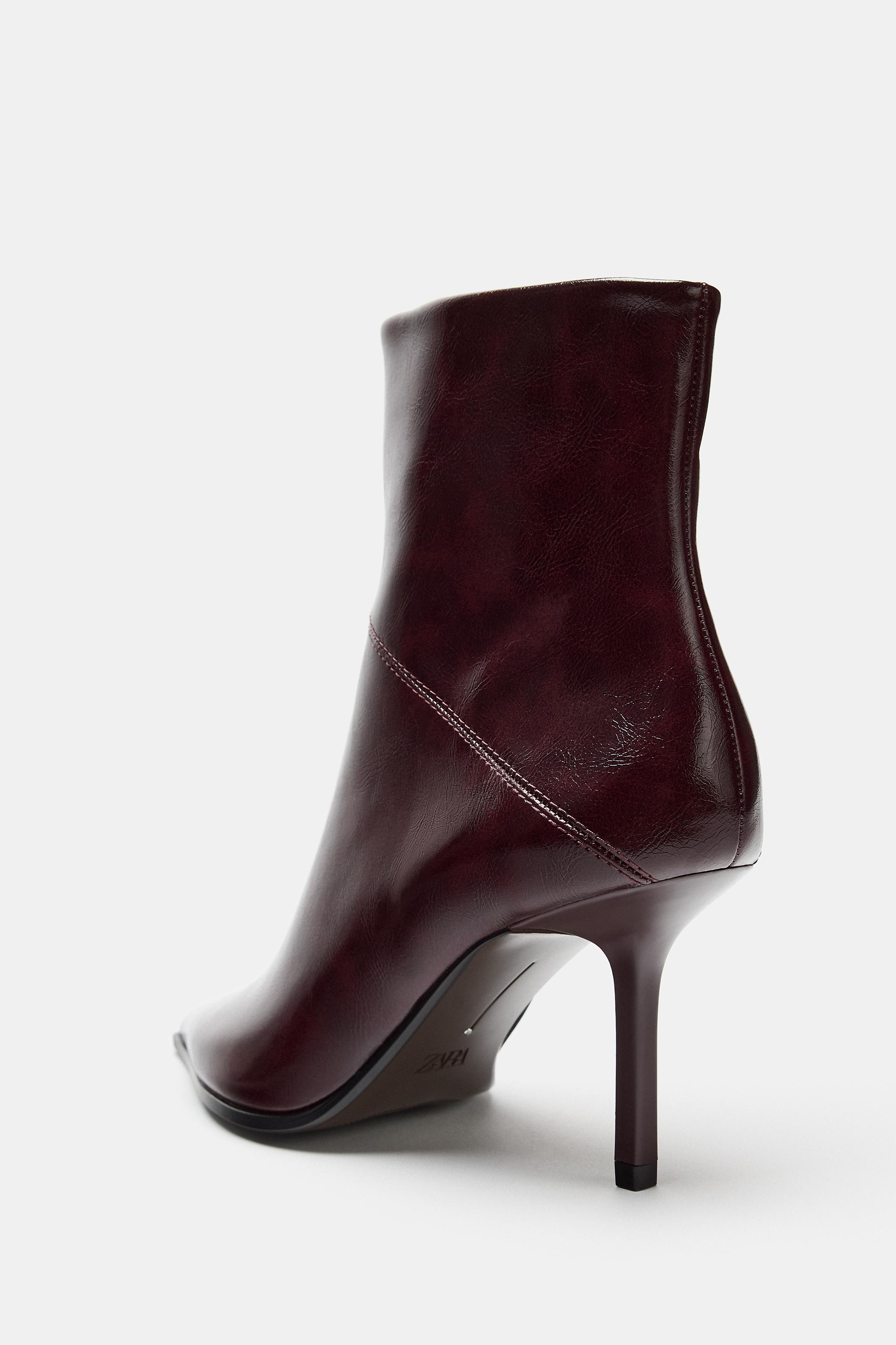 PATENT HEELED BOOTIES