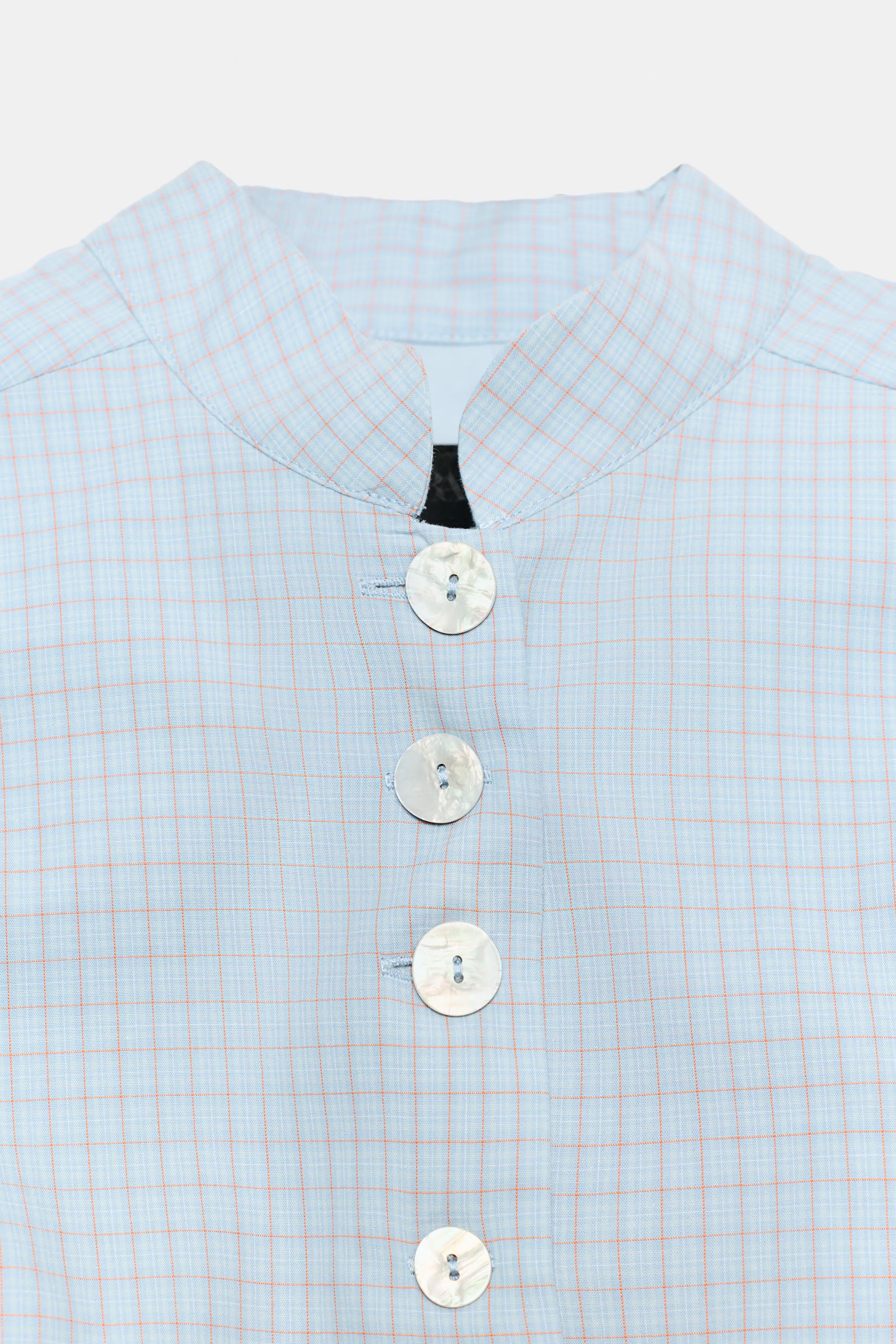 CHECKED PEPLUM TOP