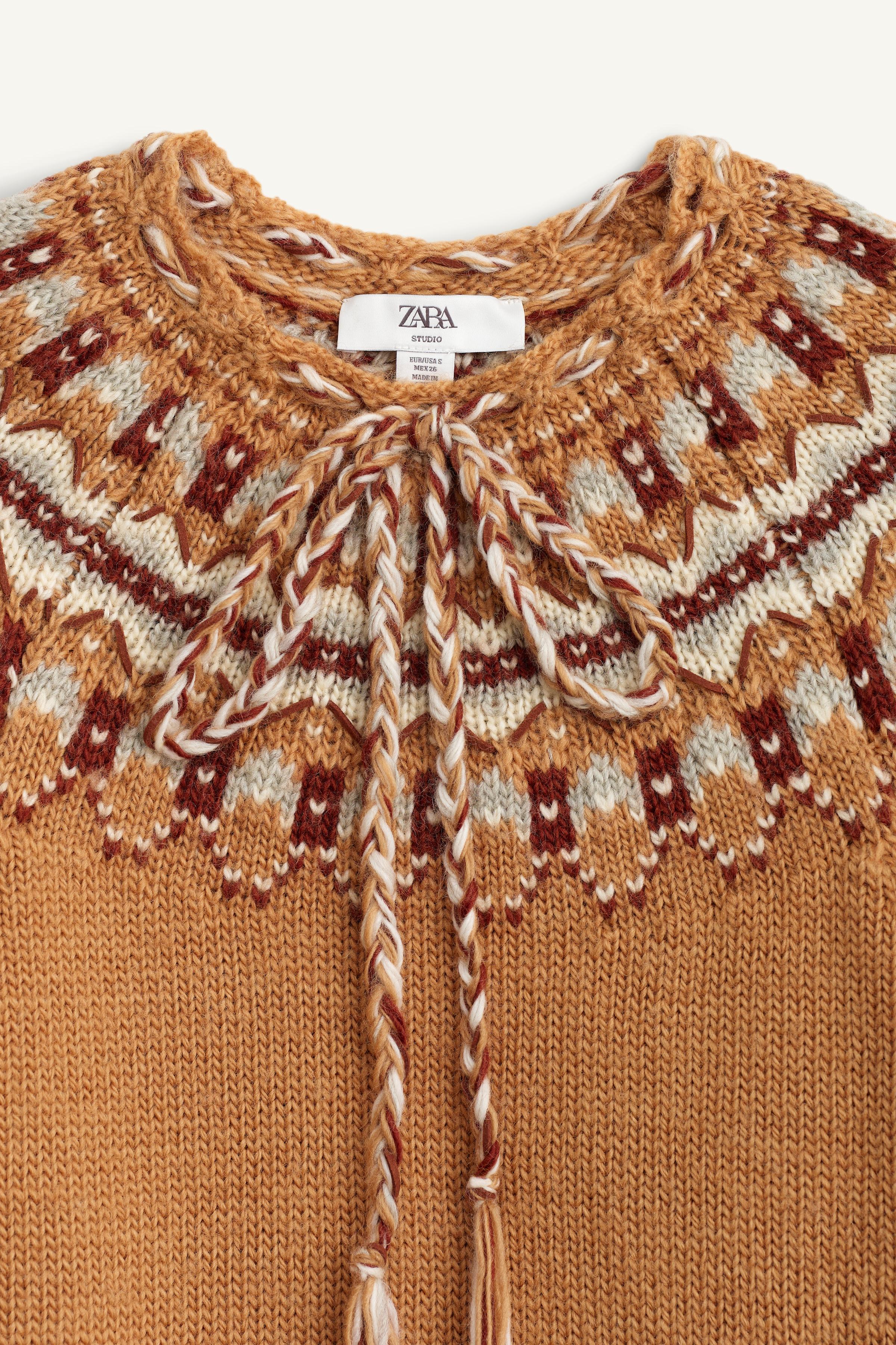 LIMITED EDITION 100% WOOL JACQUARD KNIT PONCHO